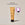 A tube of ACURE Radically Rejuvenating Eye Cream next to a circle displaying old packaging and a text calling out: New look, same proven formula
